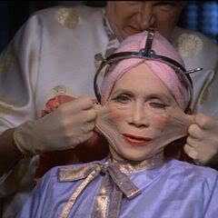 Katherine Helmond getting her face stretched in the movie Brazil